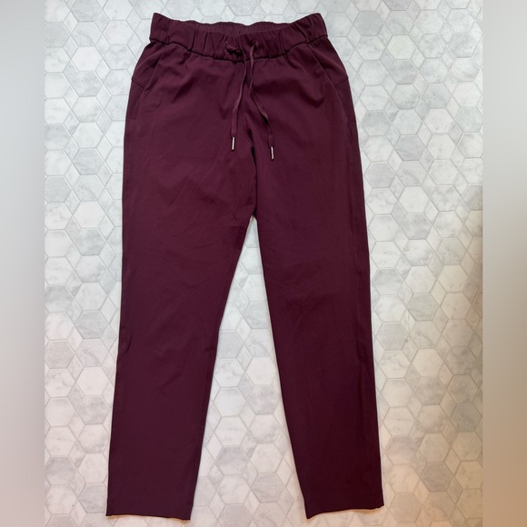 Lululemon On the Fly 7/8 Pants
Dark Adobe Maroon Size 4 EUC - Picture 6 of 13